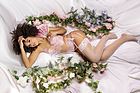 Romantic lingerie set, straps over bust, floral lace, garter belt